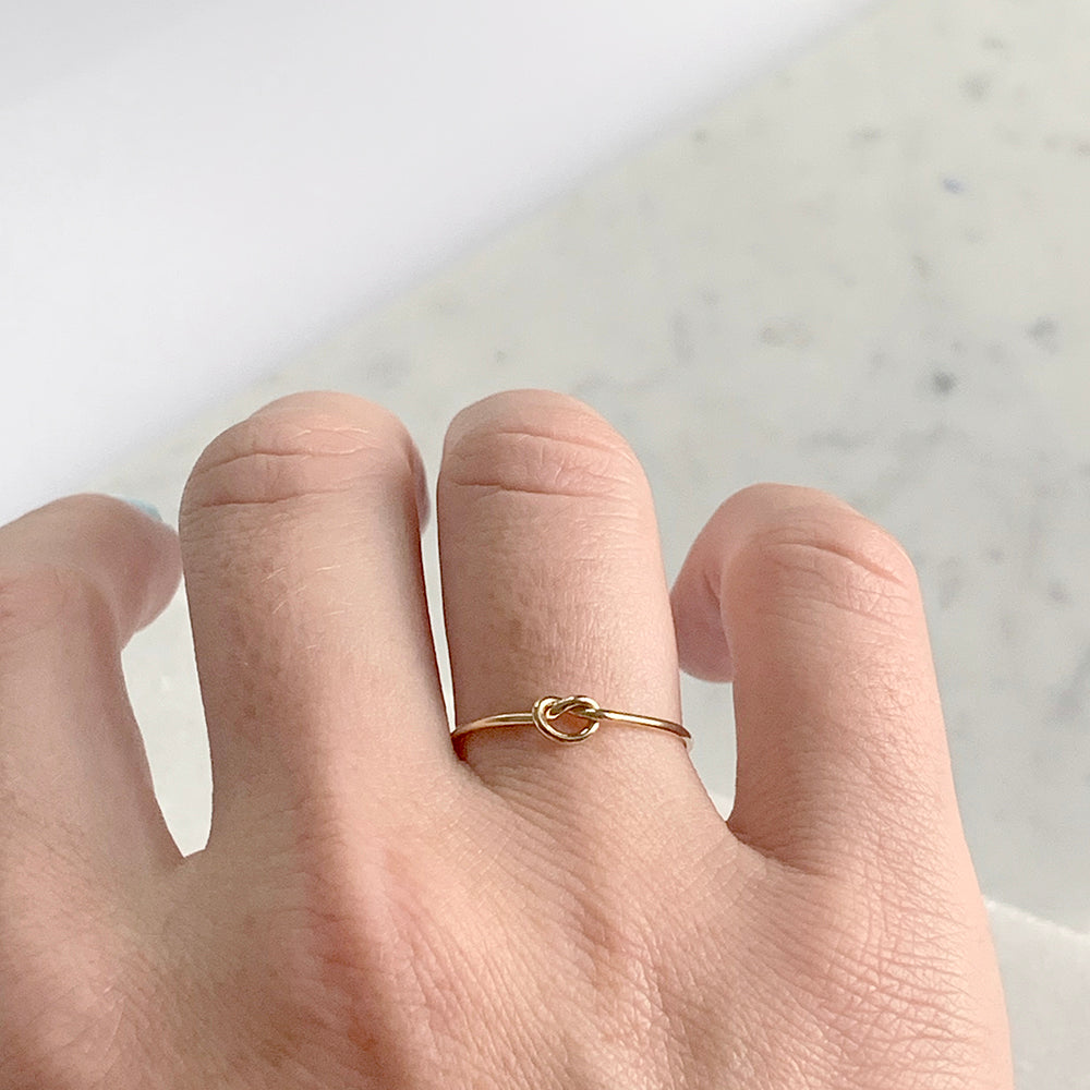 Tiny knot store ring